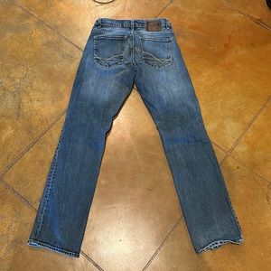 Men’s Buckle- Reclaim Blue Jeans 27R